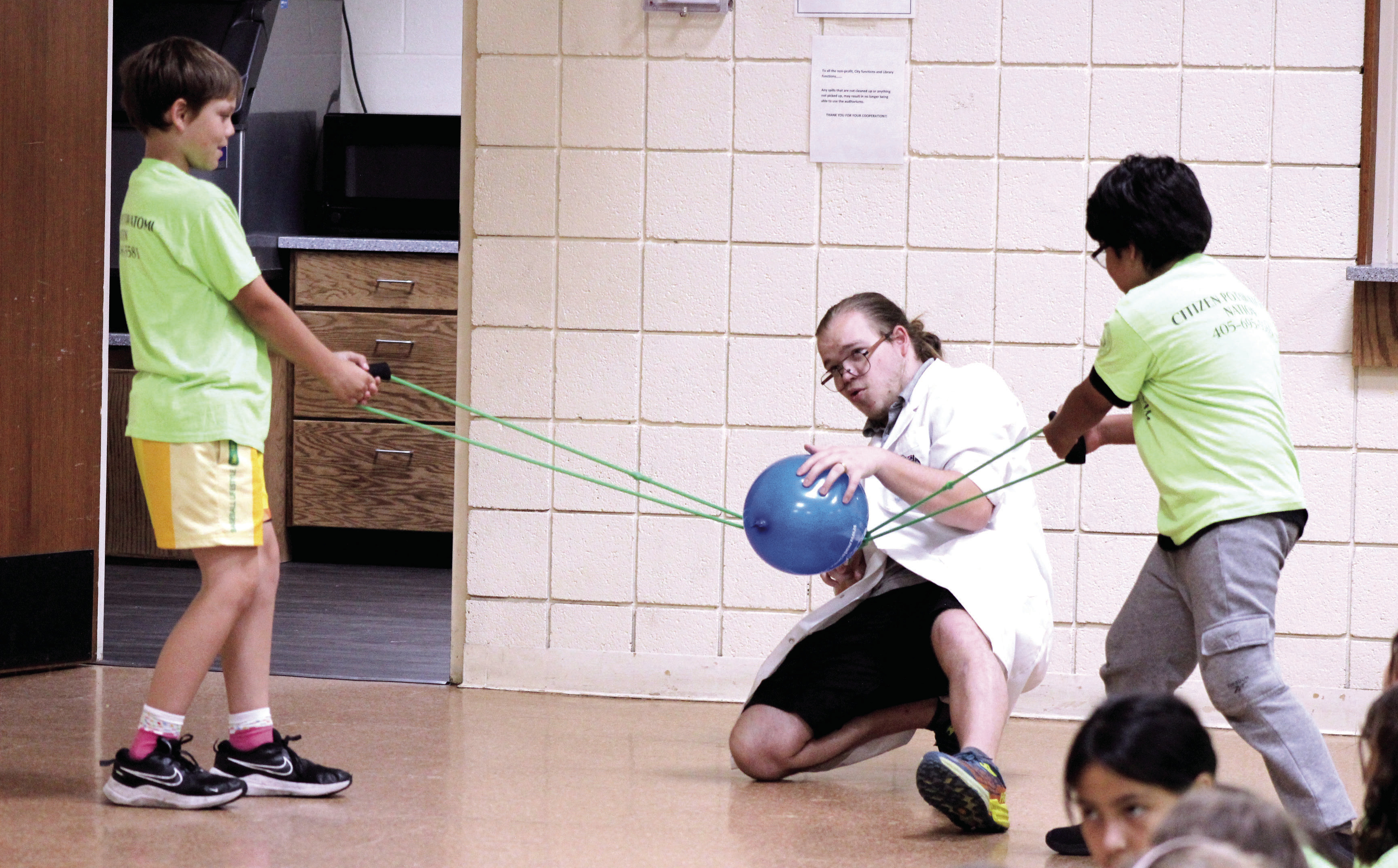 Gideon Morris, aka Dr. Arthropod of Mad Science in OKC, gets help from CPN After-School students Wyatt May and Tenetke Mato in launching a balloon into the air during the 'Artsplosion' show at Tecumseh Public Library on June 5. Morris also demonstrated how science can help to make art with heat-sensitive paper, a UV light pen and other items. Visit the Pioneer Library System website for a complete calendar of events. 
