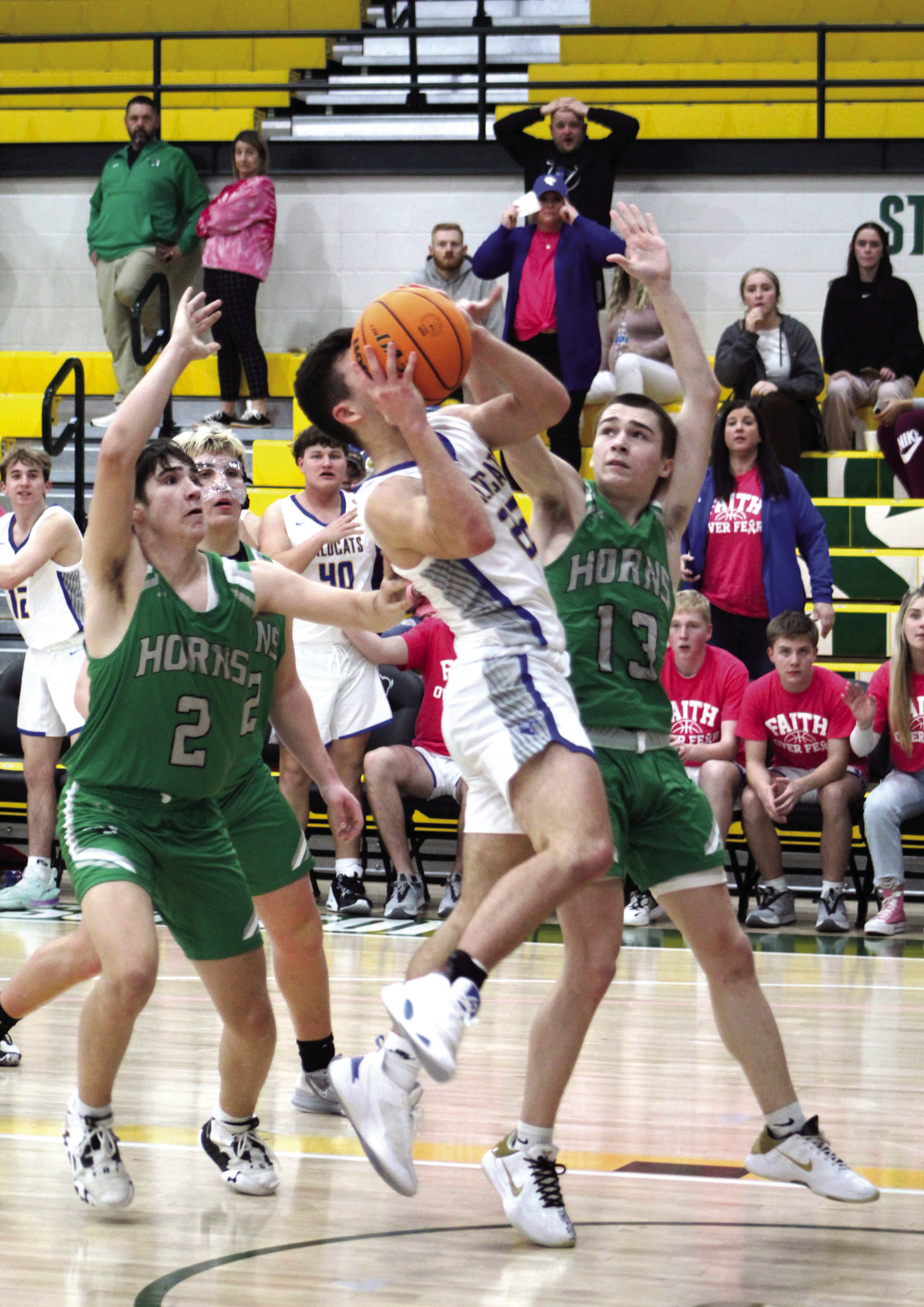 Bethel junior Bray Bussell tries for a basket in the last few seconds of the Jones game and draws the foul on Feb. 13. The Wildcats won by one point, 56-55. On Feb. 17, they beat Okmulgee to win Districts, 65-63. Today (Feb. 23) they will play at Prague in Regionals at 7:30. Countywide &amp; Sun/Natasha Dunagan