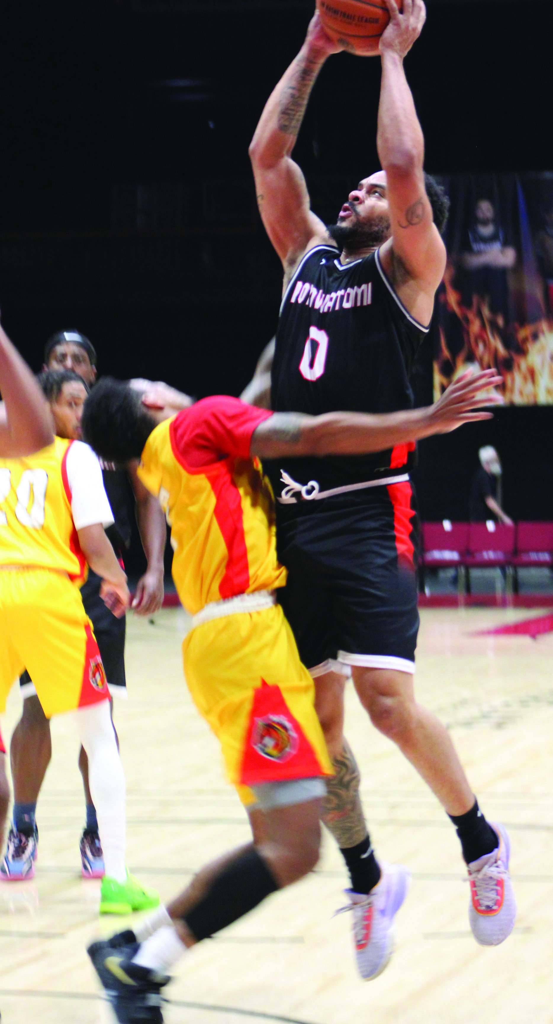 Potawatomi Fire Guard Deshawn Munson throws up a shot and makes it in the second quarter of the home game with the Shreveport Mavericks, March 31. The Fire won, 131-106. Countywide & Sun/Natasha Dunagan
