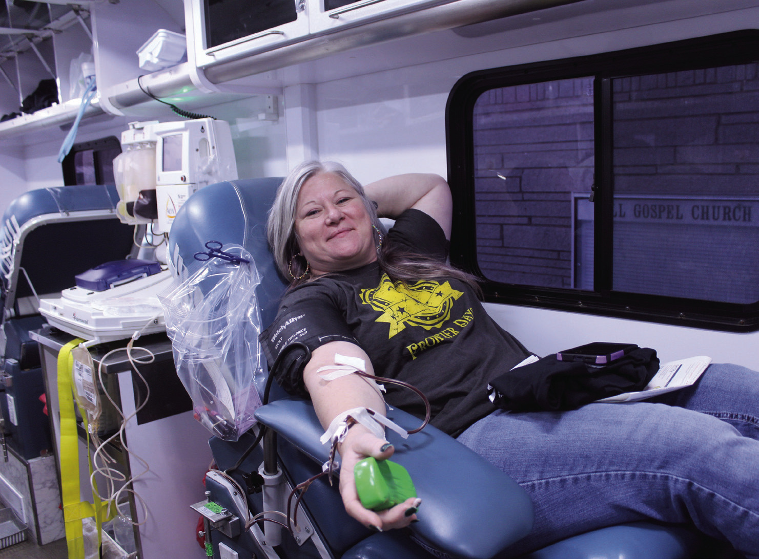 Tecumseh Chamber of Commerce Executive Director Kim Elliott makes her donation on the Oklahoma Blood Institute Bloodmobile during the Tecumseh Community Blood Drive on Dec. 19. Elliott has donated 30 times and said the Chamber changed the blood drive from annual to every two months when she took the job. Elliott added that OBI joined the Chamber in December. Natasha Dunagan, Countywide & Sun