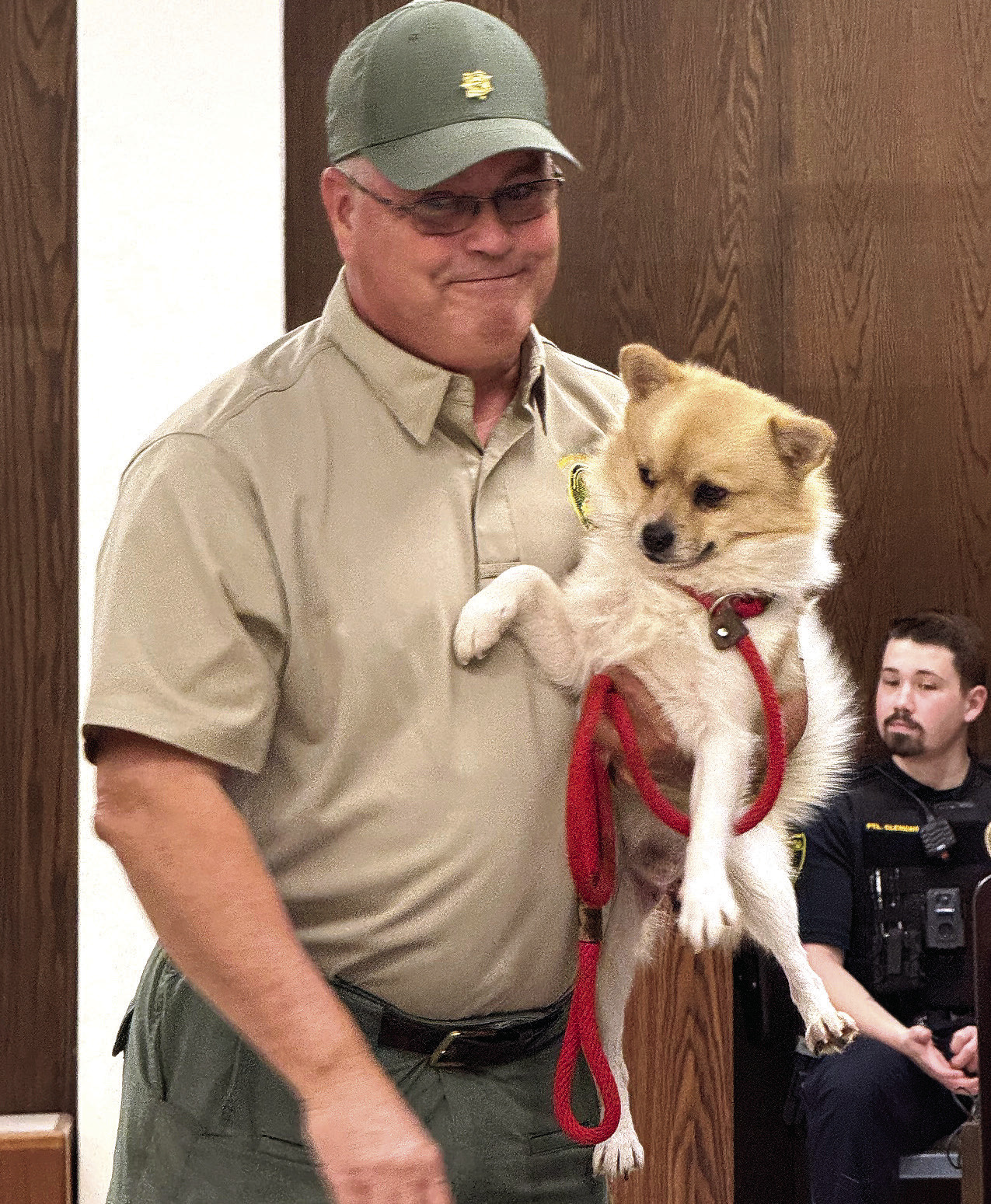 Shawnee City Commissioners were introduced to Bolt, a Pomeranian mix, getting the title of Pet of the Month by Animal Control during the February meeting. Bolt is held by Animal Control Officer Rice. Julie Talton, Countywide & Sun
