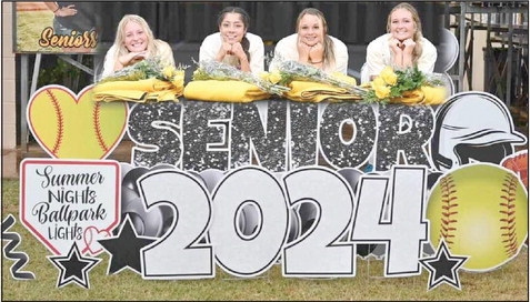 Tecumseh High School held their Fast Pitch Senior Night ceremony during the varsity game on Sept. 11. It was held in the Alumni Building due to stormy weather. Shown, from left, are Grace Wright, Serenity Jacoway, Khylei Daniels and Samantha Schweighardt. Photo provided by Kenetta Lisenbee.