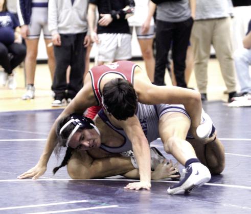 Shawnee's Jaxon Shawnee tries to escape a take-down during the home dual against Del City on Jan. 8. Natasha Dunagan, Countywide &amp;amp; Sun