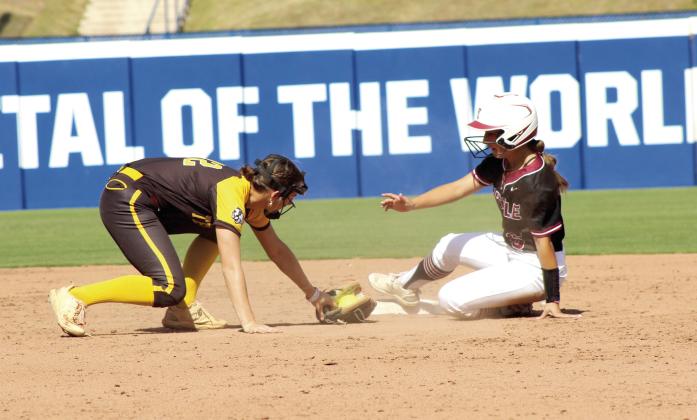 Tecumseh senior Cadence Leba recovers her glove after making the catch at second base in the sixth inning of the Class 4A Fast Pitch State Quarterfinal game against Tuttle, held at Devon Park in OKC on Oct. 16. The Lady Savages lost, 0-5, but ended the season ranked sixth with a 29-10 record. Photos by Natasha Dunagan, Countywide &amp;amp; Sun