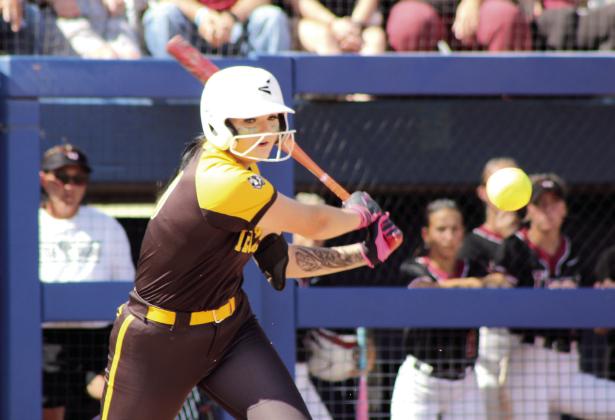 Tecumseh junior Jacee Townsend looks toward first base after making contact.