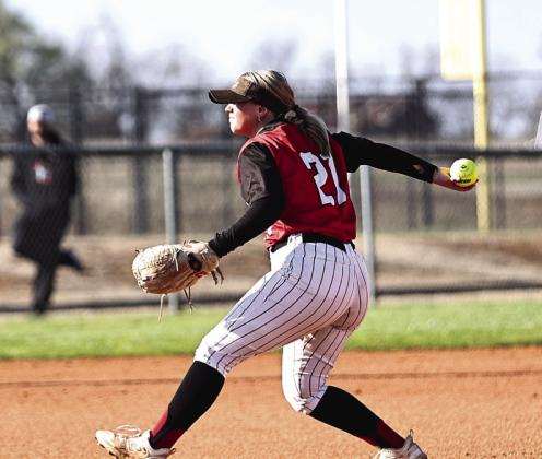 North Rock Creek’s Raynee Bass winds up for the pitch in the scrimmage against Westmoore Friday, Mar. 1.