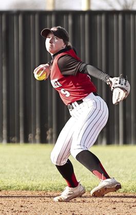 North Rock Creek’s Haley Hacker looks to throw out at 1st base.
