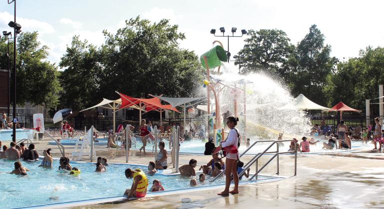 Kids and adults have fun in the mid-depth regulation pool and the shallow play area, as the bucket dumps water, on Sat., Aug. 6. Between the hours of 3-7 pm that day, 357 people visited the water park, before it closes on Aug.12. According to Shawnee City Manager Andrea Weckmueller-Behringer, as of Aug. 9, Shawnee Splash has seen 30,911 patrons in its eighth season and the lifeguards have "performed 31 successful water rescues." Countywide &amp; Sun/Natasha Dunagan