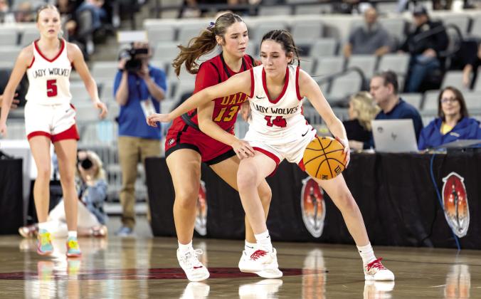 Peyton Bays applies some defensive pressure to the Vanoss player. Photos courtesy of Rick Hester, Lincoln County News
