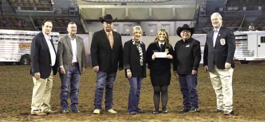 Pictured from left: OYE Vice Chairman Jimmy Harrel, AFR Board Member Ron Ramming, AFR Cooperative Vice President Toby Wallace, Executive Operation Coordinator Ashley White, Poppy Robinson, AFR Cooperative President Scott Blubaugh, and AFR Agent Randy Gilbert. Photo provided by AFR