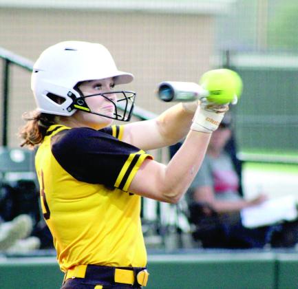 Tecumseh sophomore Josie Walker sees eye to eye with the ball before sending it flying during the game against Shattuck in the Dale Slow Pitch Festival at FireLake Ball Fields on April 17. Over the two-day tournament, the Lady Savages sank Shattuck, 20-9; pushed past Pryor, 6-4; canceled Cache, 8-3; and fell to Silo, 8-13. Natasha Dunagan, Countywide &amp; Sun