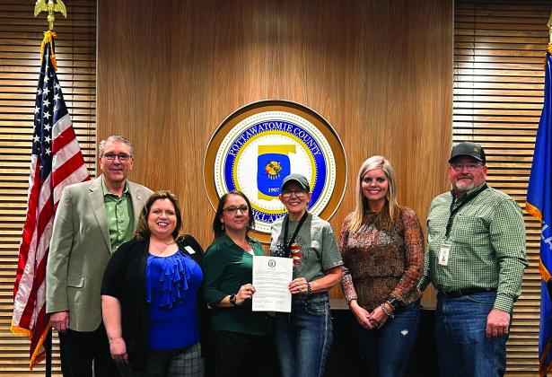 Pictured from left Robert Richards, April Grant, Ronelle Baker, Commissioners Melissa Dennis, Abby Thompson, and Greg Rush pose for a photo after the meeting. Countywide &amp;amp; Sun/Suzie Campbell