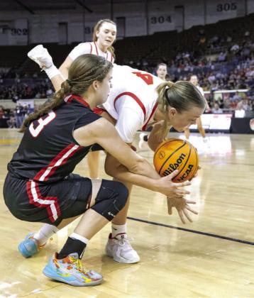 Dale's Ava Bell fights for a loose ball in the corner of the court in State semi-final action against Oklahoma Bible Academy. The Lady Pirates lost 58-47.