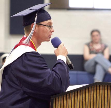 Asher High School Salutatorian Ethan Green addresses his classmates during the Commencement Ceremony on May 13. Countywide &amp;amp; Sun/Natasha Dunagan
