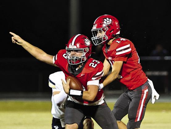 North Rock Creek’s Brodie Grace celebrates after recovering a fumble. Photo courtesy of Gowin Photography