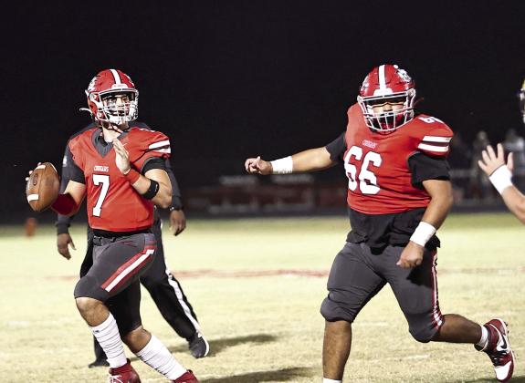 North Rock Creek’s Landon Kelough looks down field in home action Friday, Oct. 25. NRC lost its final home game of regular season to Kingfisher, 45-41. The Cougars will travel to Plainview Friday, Nov. 1.