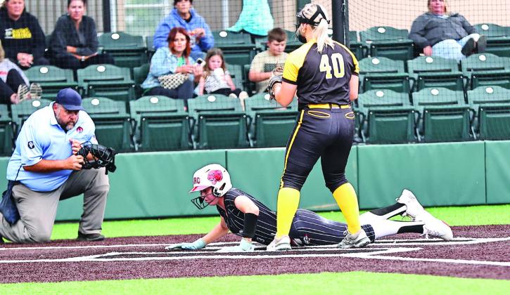 The NRC softball team took on Tecumseh at Firelake. NRC won 5-0. Sophie Morris slides safely home. Photo Courtesy of Gowin Photography