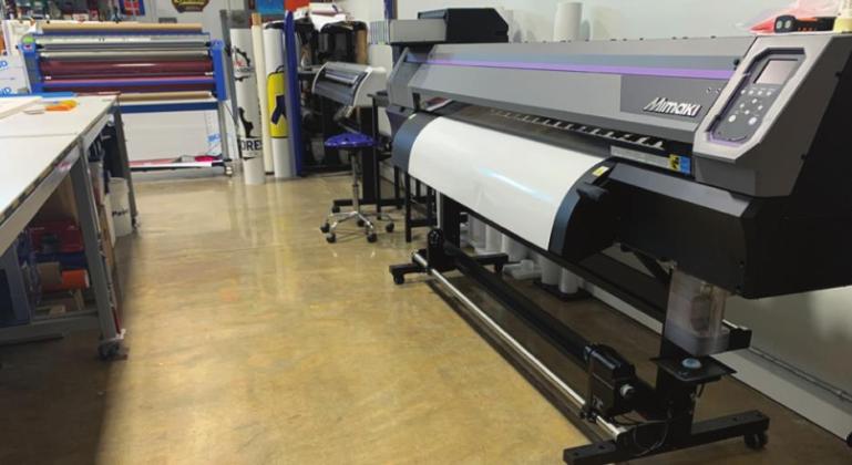 Yearwood Design Works has the equipment to produce signs of all kinds. Shown, at right, is the new Mimaki 64-inch roll-to-roll printer. Owner Mark Yearwood said it prints the decals, banners, and vehicle wraps - “anything on a roll.” Photo provided.
