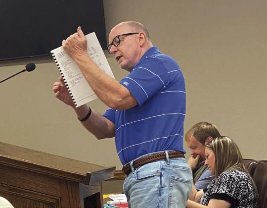 Casey Russell, with Russell and Williams CPA’s PC, goes over the city audit with the council at the McLoud Sept. meeting. Julie Talton, Countywide &amp;amp; Sun