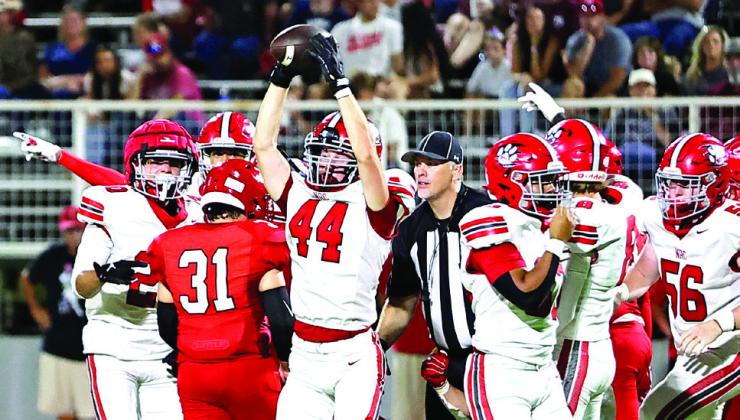NRC's Trip Swan celebrates after recovering a Prague fumble on Sept. 12. Friday, NRC will host Holdenville for their first home game of the season on their new turf field.