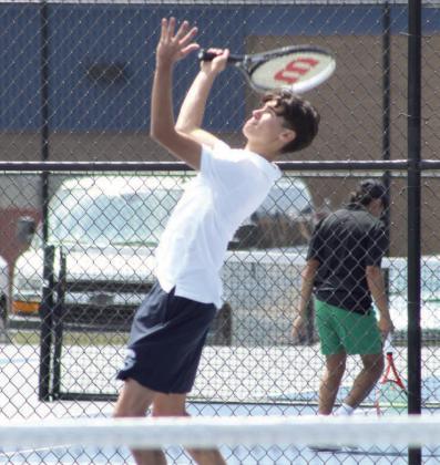 Shawnee's Grady Smith serves during the Shawnee NGB Tournament, held at SHS and OBU on May 2. Smith competed with Connor Taylor on Extra Doubles. Natasha Dunagan, Countywide &amp;amp; Sun