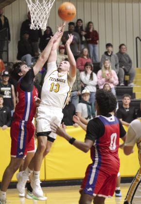 Tecumseh senior Creed Wright reaches for the basket but gets fouled in the Dec. 5 home game against Chandler. Natasha Dunagan, Countywide &amp; Sun