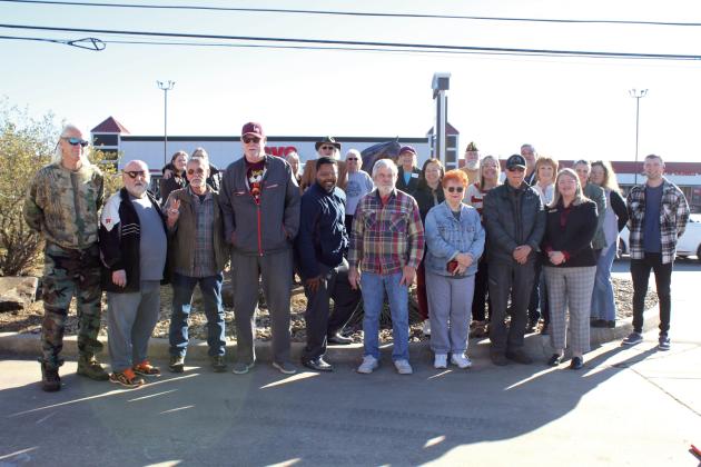Veterans from the Shawnee area and members of the VFW and American Legion pose in front of the Plaza East Labyrinth Office Park, at 722 E. Independence, around Tony, the latest “Horse in the City,” on Jan. 16. Tony is dedicated to U.S. Veterans and has been planned for a few years. Countywide &amp; Sun/Natasha Dunagan