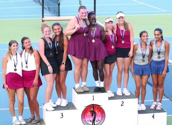 Tecumseh #1 Doubles Team Laycee Thoma and Jalee Meyers, both seniors, stand on the podium after playing four rounds and winning third place during the Class 4A State Girls Tennis Tournament. Lili Lowden, Kalyn Bartmess, Kyann Sells, and Amanda Magill also competed at state on May 9-10 in OKC. Photo courtesy of Jennifer McKnight