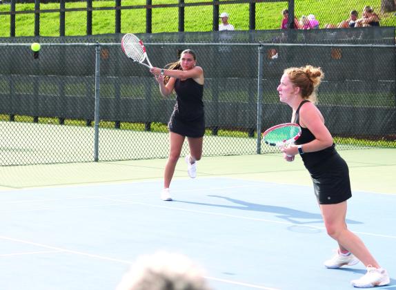 Tecumseh seniors Jalee Meyers and Laycee Thoma compete during the Class 4A State Girls Tennis Tournament. The #1 Doubles Team played four matches and placed third overall. Photo courtesy of Jennifer McKnight