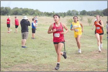 Earlsboro freshman Karmalea Howell (#6316) endures in the Small School Girls Two-Mile Run. According to ohstrack.com, Howell placed 11th out of 34 girls, and Earlsboro placed first as a team, with a total time of 1:23:08. The NRC Girls Team placed first in the Large School Girls division with a total time of 1:11:38. Countywide &amp;amp; Sun/Natasha Dunagan