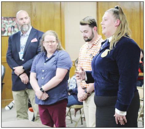 Shawnee Senior and FFA Vice President Macy Nelson, far right, speaks with the Shawnee Board of Education about her experiences in Agriculture Education classes during the April 4 meeting. Also shown, from left, are Shawnee High School Principal Matt Johnson and Ag teachers Jordan Miller and Chase Ferguson. Countywide &amp;amp; Sun/Natasha Dunagan