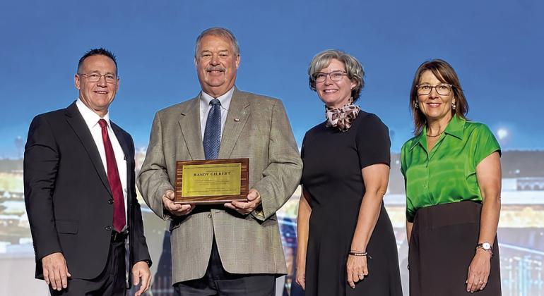 Randy Gilbert has been named a 2026 recipient of the Barbara Lynch Community Partner Award during the Aug. 15, 2026, Oklahoma State School Board Association/Cooperative Council for Oklahoma School Administration (OSSBA/CCOSA) Education Leadership Conference. Pictured, from left, are Dr. Shawn Hime, executive director of OSSBA, Gilbert, Julie McCormick, Superintendent of GCTC, and Melissa Abdo, president of the OSSBA. Photo provided