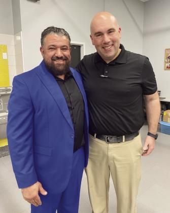 The Tecumseh School Board approved the hiring of Tarek Aissaoui as the THS Assistant Principal at the August meeting. Aissaoui (left) poses with Superintendent Robert Kinsey. Julie Talton, Countywide &amp; Sun