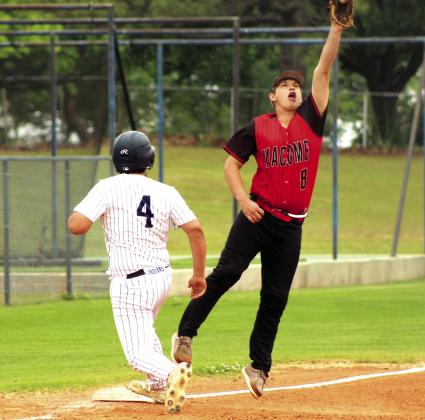 Macomb senior Christian Flowers jumps for the catch and the out at third base, as Asher sophomore Erick Cole runs back to touch base, during the first inning of the Class B District Baseball Tournament at Asher on April 22. Photos by Natasha Dunagan, Countywide &amp; Sun
