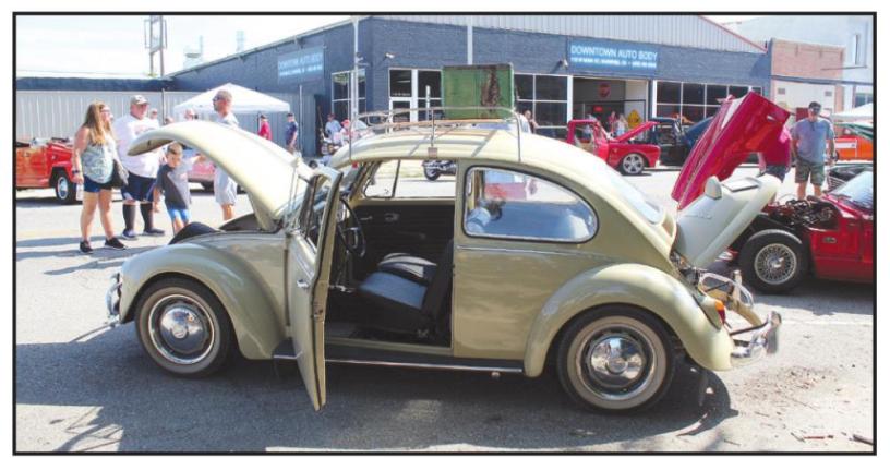 A 1967 Volkswagen Beetle was one of more than 178 entries in the City of 5 Nations Downtown Auto Show &amp; Shine, hosted by Downtown Auto Body, which is seen across Main Street in Shawnee. The Bug is owned by Jim and Donna Liddle, of Prague, and Jim said he has owned it since he was 19 years old and worked on it for more than 20 years. Countywide &amp; Sun/Natasha Dunagan