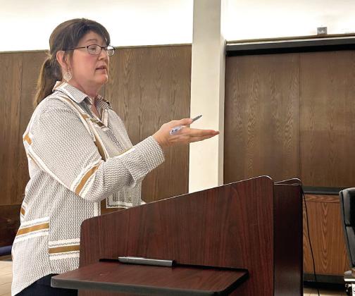 Stacey Bateman-Woods, Attorney for the Pottawatomie County Commissioners, addresses the SCCDA Board regarding the contract to transfer IFYR intellectual property to the County. Suzie Campbell, Countywide &amp;amp; Sun