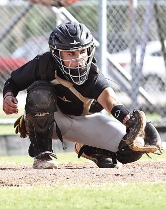 Tecumseh catcher makes the stop.