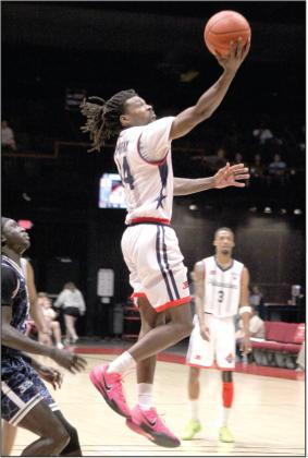 Potawatomi Fire Guard Jahmal McMurray takes his shot in the fourth quarter of the second game in The Basketball League Finals. McMurray was named TBL Finals MVP.