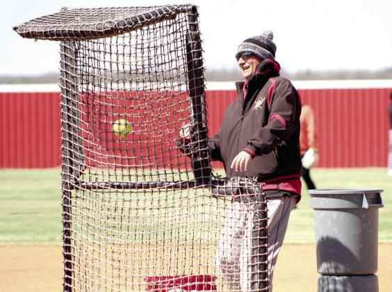 Dale Head Softball Coach Andy Powell pitches during the Homerun Derby portion of the First Annual Dale High School Alumni Slowpitch Softball Game.