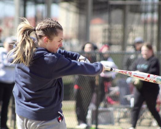 Dale 2021 graduate Danyn Lang sends a ball screaming during the First Annual Dale High School Alumni Slowpitch Softball Game..