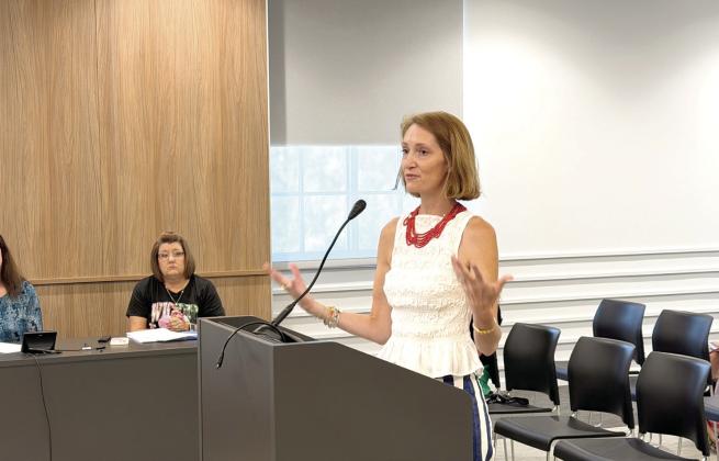 Rachael Geiger with the OKC Philharmonic answers questions from the Commissioners at the meeting held Tuesday, Aug. 11. Commissioners approved a $35,000 sponsorship, for the Christmas concert to be heald at The Grand on Dec. 7. Suzie Campbell, Countywide &amp;amp; Sun