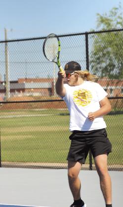 Ted Belshe, on the Tecumseh #1 Doubles team with Henson, volleys the ball during the tournament. Natasha Dunagan, Countywide &amp;amp; Sun