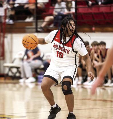 Earlsboro Wildcat senior looks for an opening. Photos courtesy of Amanda Elmore