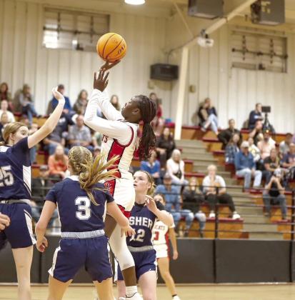 Earlsboro’s Zeaonna McGregor puts up a floater. Photos courtesy of Amanda Elmore