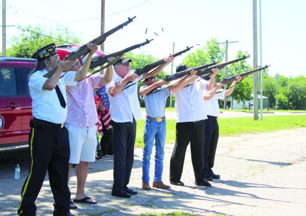 An honor guard led by members of the American Legion Post 260 gives an 18-gun salute during the Memorial Day service at Tecumseh Cemetery on May 27. There were also wreaths placed for each military branch and the emergency responders. Rev. Paul Fletcher, with Northridge Church of Christ in Shawnee, and State Senator Shane Jett spoke, as well as Post Adjutant Bill Gammage. Shown, from left, are Gammage, Fletcher, Vice Commander Alynn Stewart, Abraham Seper, CSM George Seper and Chaplain Stuart Rose.