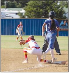 Bethel junior Layla Menhusen reaches the plate as Dale’s Holland Herring waits for the throw in the fourth inning of the Bethel home game on Aug. 29.
