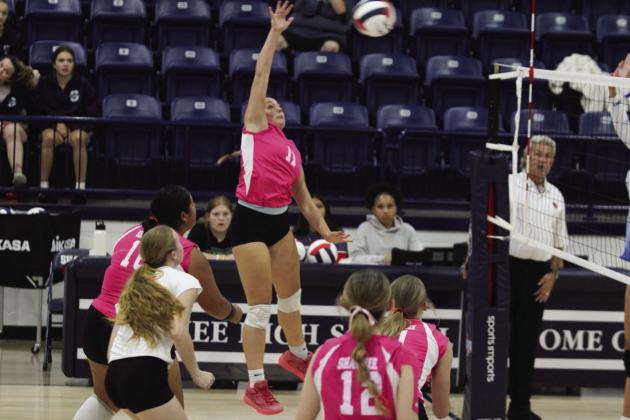 Shawnee’s Serenity Casteel jumps up to make contact with the ball during the home volleyball match with Guthrie on Pink Out Night, Oct. 1. The Lady Wolves won all three games: 25-13, 25-10, and 25-7. Countywide &amp; Sun/Natasha Dunagan