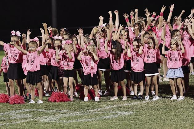 For Pink Out night, North Rock Creek’s halftime show was filled with junior cheerleaders. Photo courtesy of Gowin Photography.