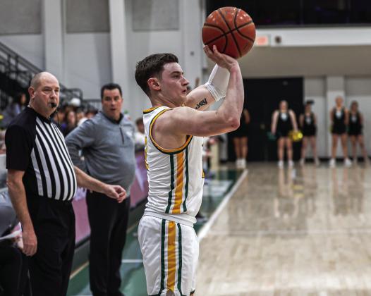 Oklahoma Baptist University’s Ethan Scott launches a three-point shot in the 75-72 win over Henderson Saturday, Jan. 18. Scott finished the game with a career-high 22 points. Photo provided by OBU