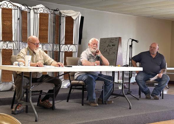 Citizens of McLoud held a debate between the candidates for the McLoud City Council Ward 4 seat on Tuesday, Mar. 25 at the First Baptist Church in McLoud. Pictured from left is candidates Thomas (Tom) Morris and Roger White. Benny Milam (far right) moderated the debate. Suzie Campbell, Countywide &amp; Sun